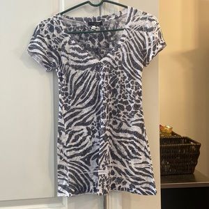 Animal print short sleeve shirt by fleurish. Size small.